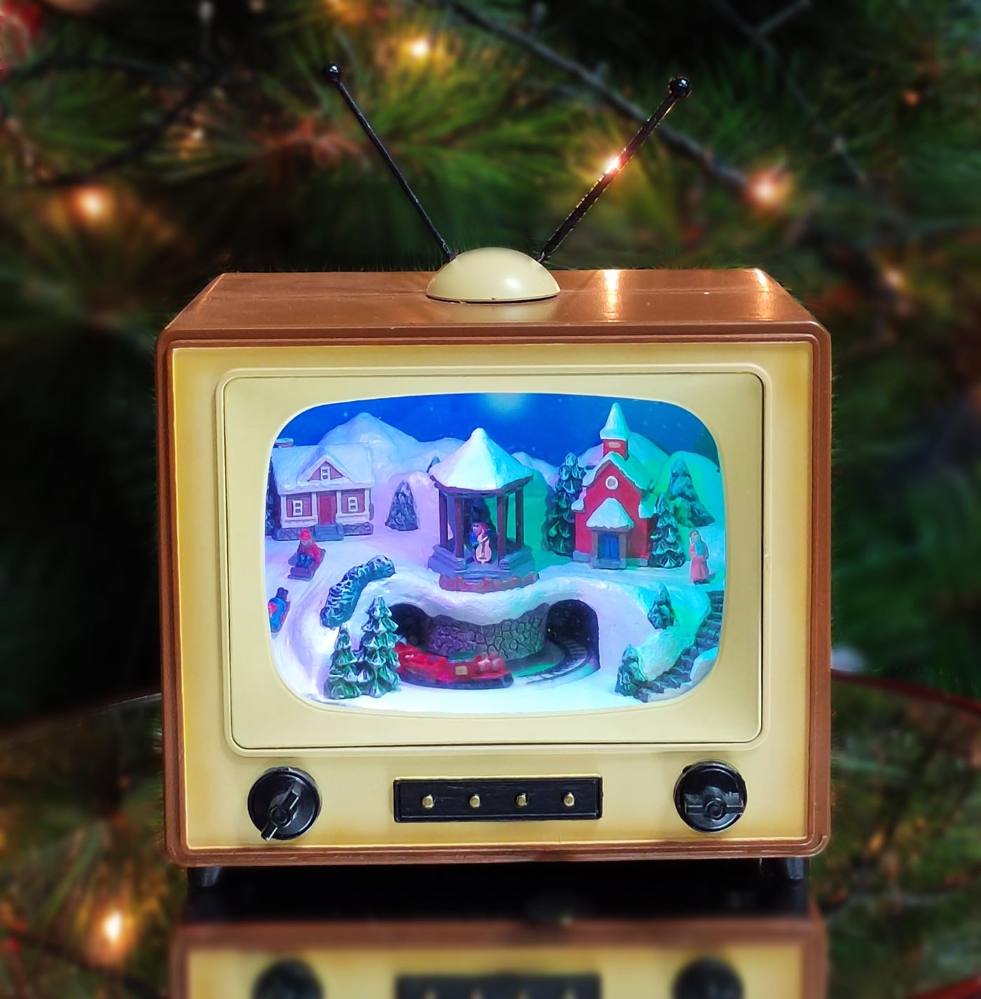 Compare MOMENTS IN TIME 6 H Brown Red Retro TV with Mountain Scene Animated Train  LED Lights 8 Classic Carols Christmas Music Battery Operated HandPainted Resin Polyresin Injection Plastic at KSA Price